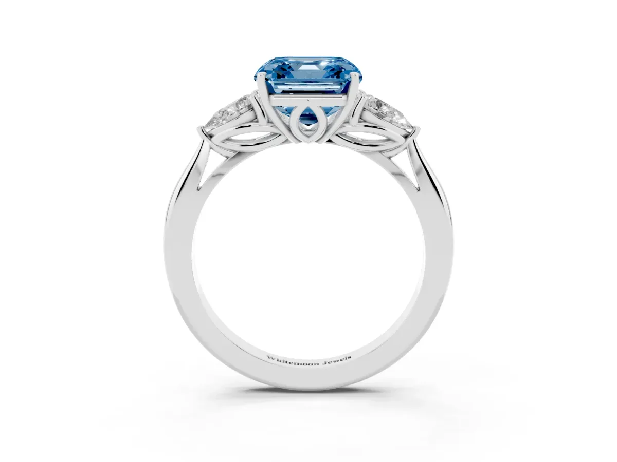 Fancy Blue Asscher Cut Diamond Three-Stone Ring with Pear Side Stones and Prong Setting Platinum