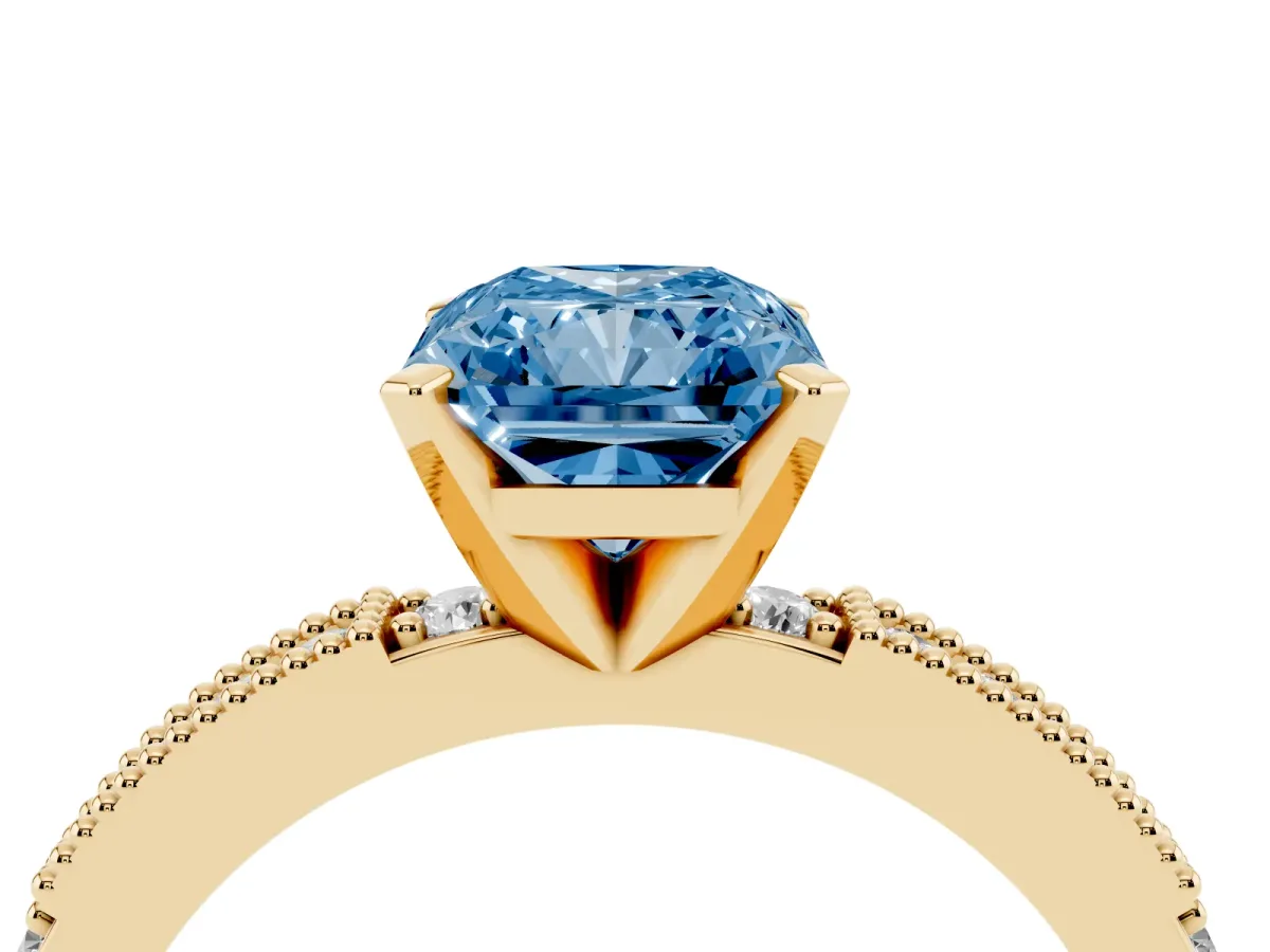 Fancy Blue Radiant Cut Solitaire with Pavé Band and Four-Prong Setting Yellow gold