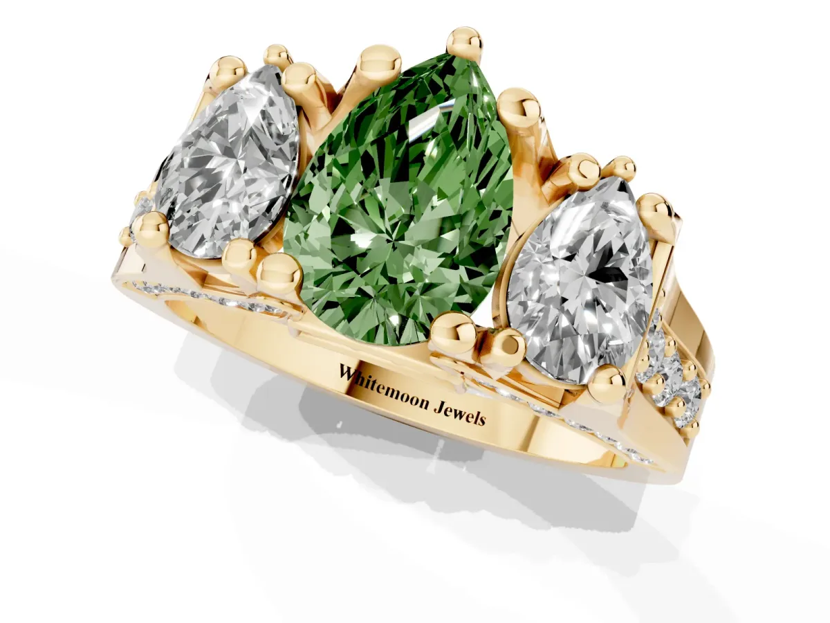 Fancy Green Pear Cut Diamond Three-Stone Ring with Channel Set Band and Four-Prong Setting Yellow gold