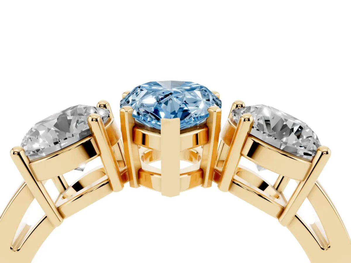Fancy Blue Three-Stone Pear Cut Diamond Ring with Round Side Stones, Classic Band, and Four-Prong Setting Yellow gold