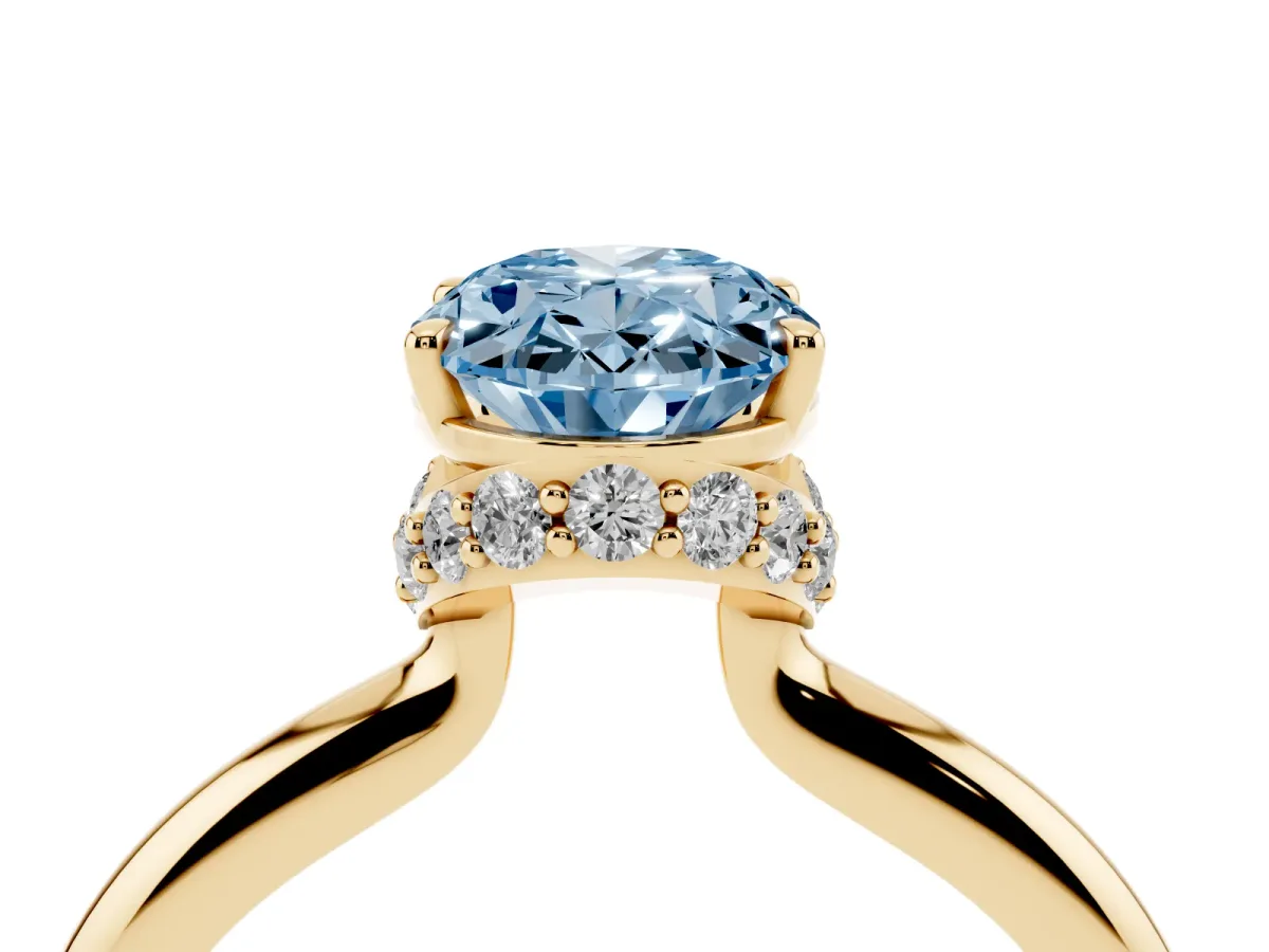 Fancy Blue Oval Cut Brilliant Solitaire Engagement Ring with Six-Prong Setting and Classic Band Yellow gold