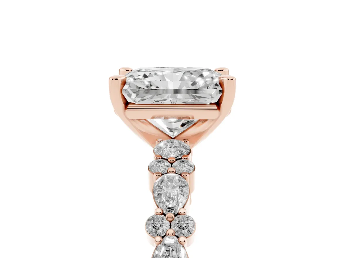 Radiant Cut Diamond Side Stone Solitaire Ring with Round and Four-Prong Setting Rose gold