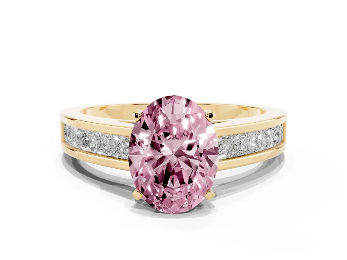 Fancy Pink Oval Cut Solitaire Diamond Ring with Channel-Set Band and Four-Prong Setting Yellow gold