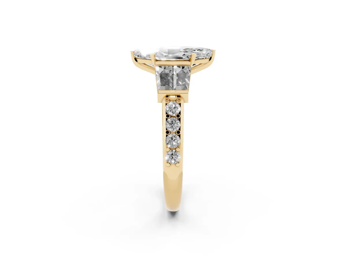 Marquise Cut Diamond Engagement Ring with Baguette Side Stones and Channel Set Band Yellow gold