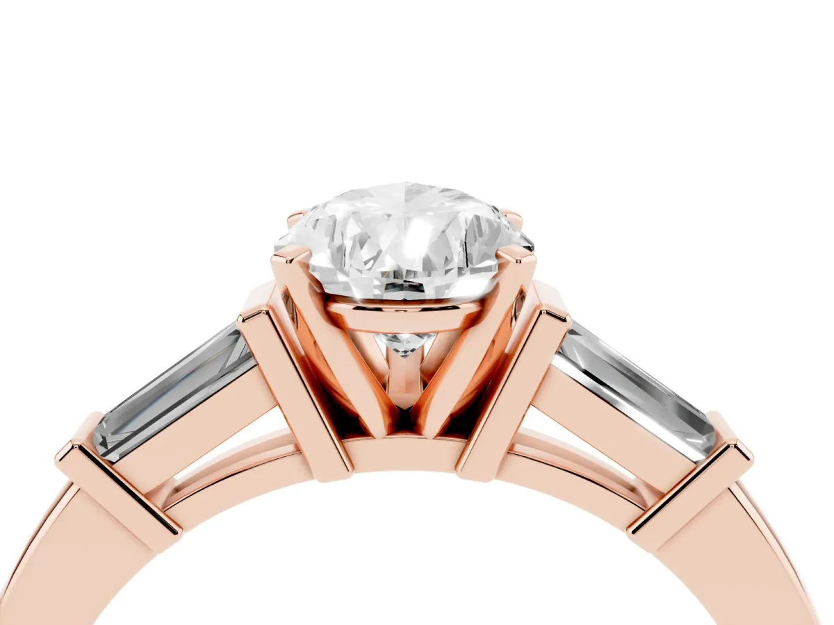 Pear Cut Cut Diamond Solitaire Ring with Tapered Baguette Accents and Four-Prong Setting Rose gold