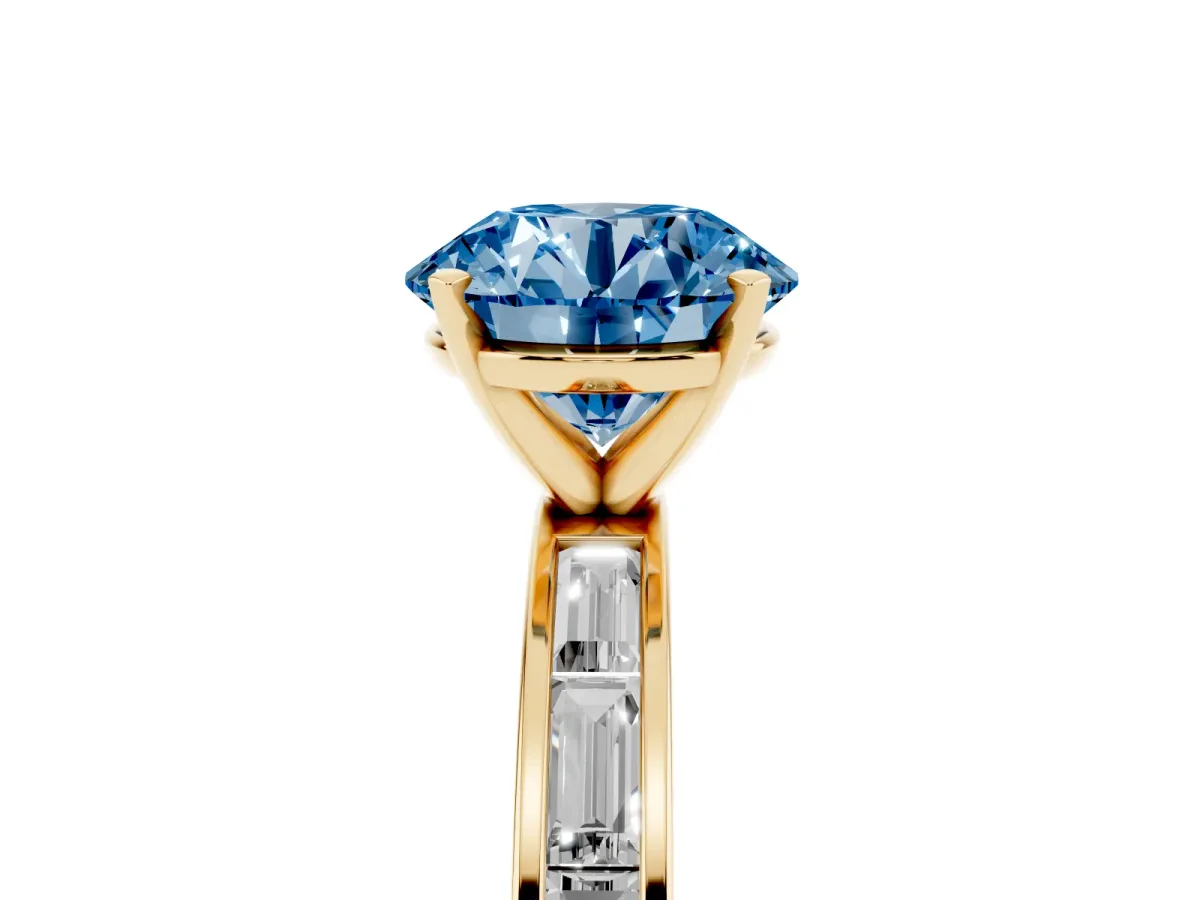 Fancy Blue Round Cut Solitaire Diamond Ring with Channel-Set Baguette Band and Four-Prong Setting Yellow gold
