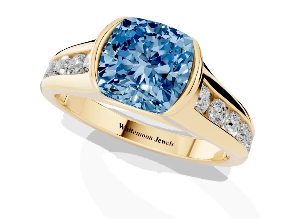 Fancy Blue Cushion Cut Solitaire Bezel-Set Diamond Ring with Channel-Set Band Yellow gold