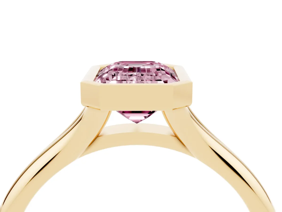 Fancy Pink Bezel Set Emerald Cut Solitaire Diamond Ring with Smooth Band Yellow gold