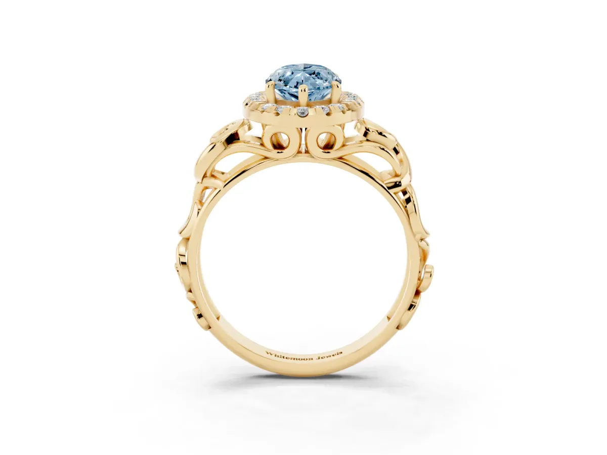 Fancy Blue Marquise Cut Cut Halo Diamond Ring with Scrollwork Band and Four-Prong Setting Yellow gold