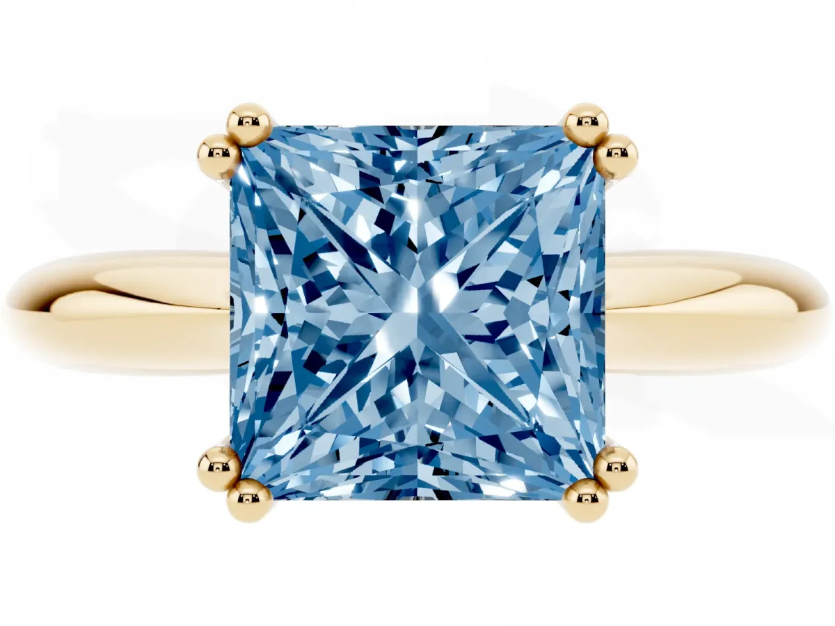 Fancy Blue Princess Cut Cut Solitaire Engagement Ring with Tapered Band and Four-Prong Setting Yellow gold