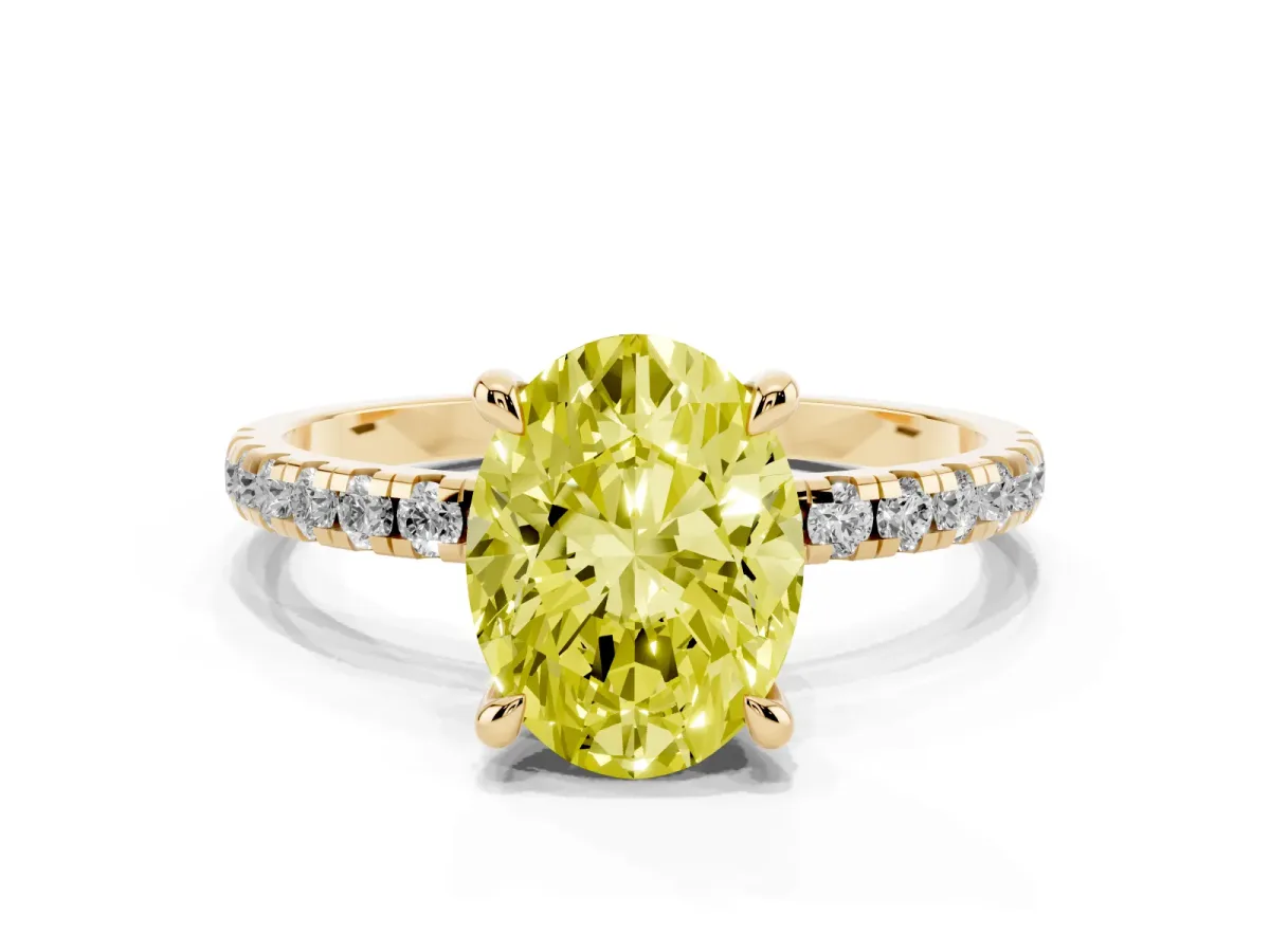 Fancy Yellow Oval Cut Diamond Brilliant Solitaire Ring with Pavé Band and Four-Prong Setting Yellow gold