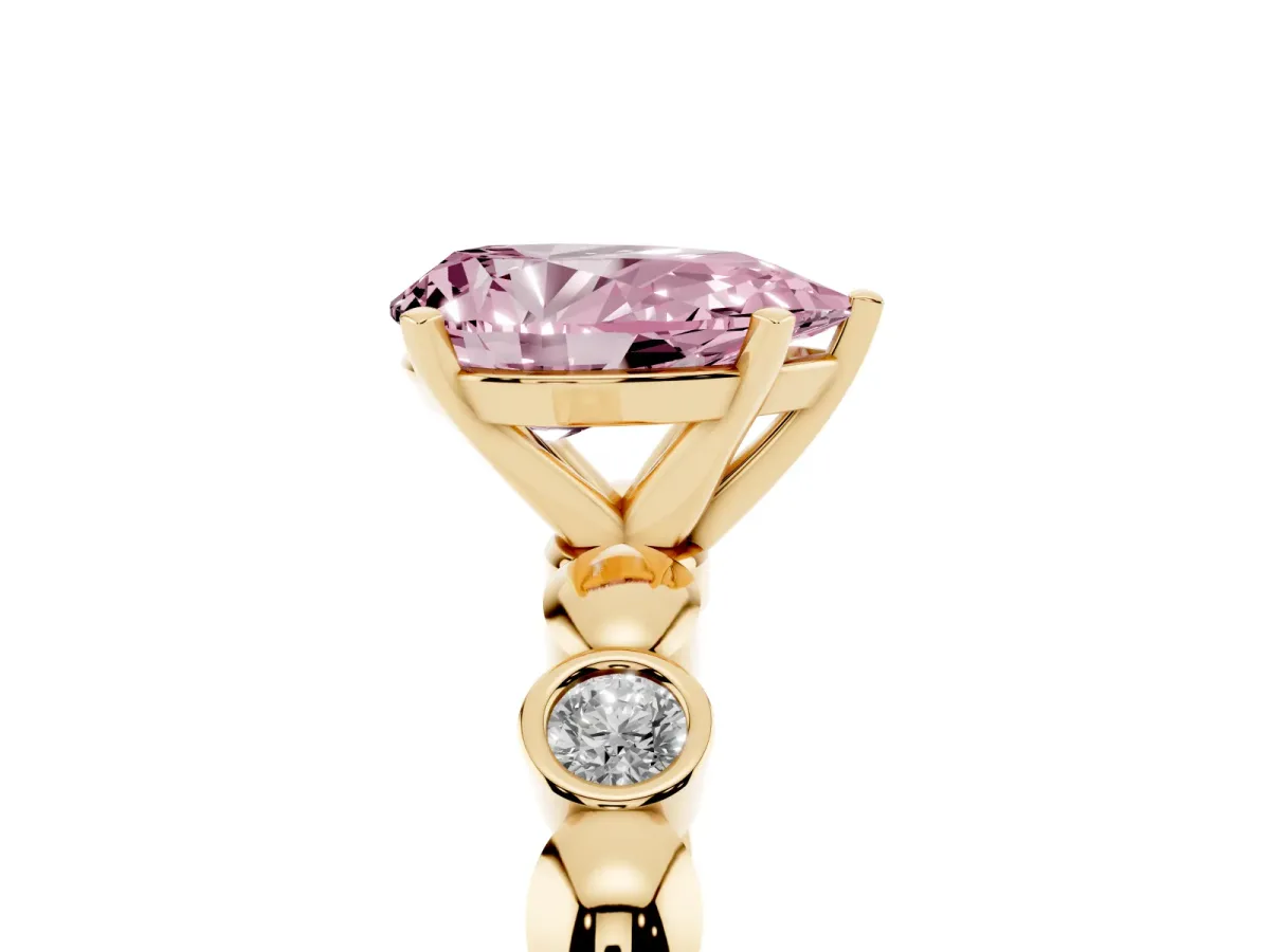 Fancy Pink Pear Cut Solitaire Bezel-Set Diamond Ring with Beaded Band and Four-Prong Setting Yellow gold