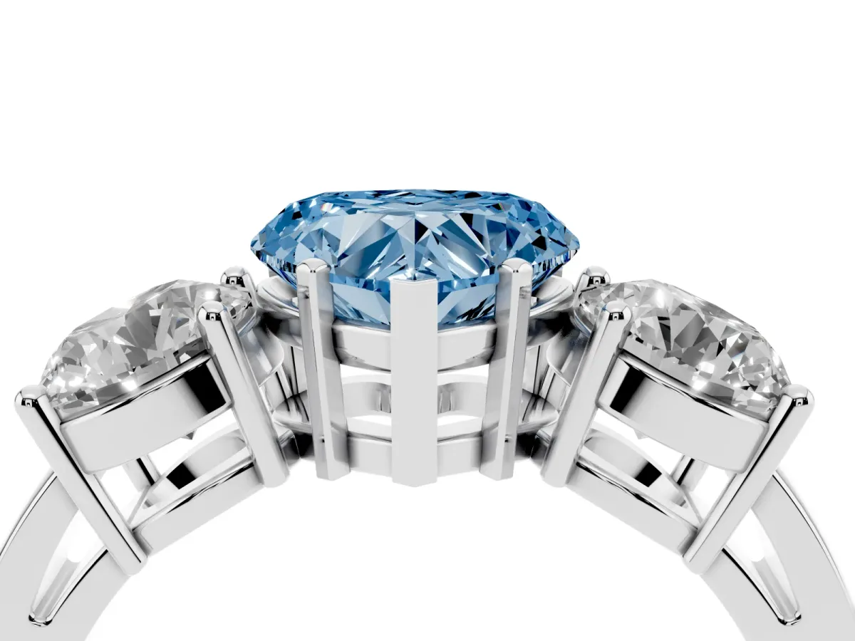 Fancy Blue Three-Stone Heart Cut Diamond Ring with Round Side Stones, Classic Band, and Four-Prong Setting Platinum