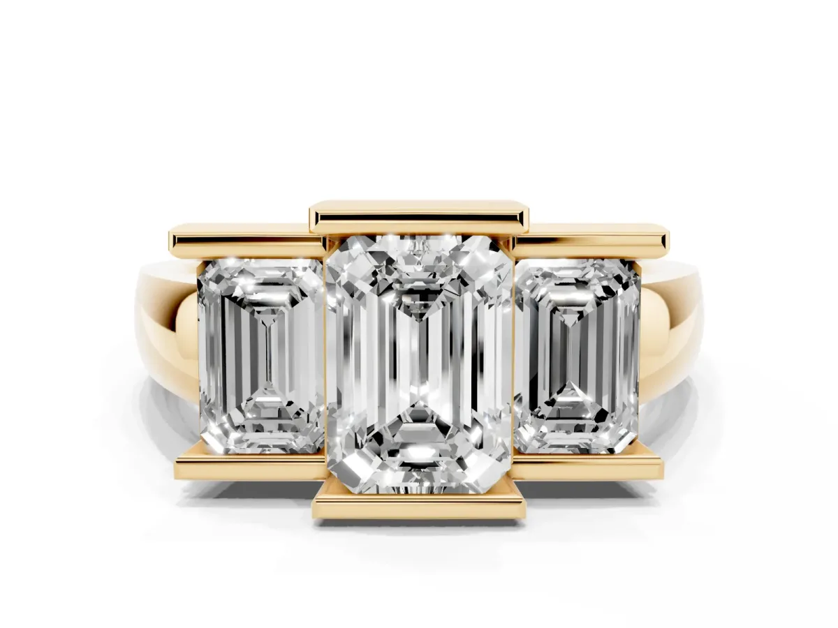 Three Stone Emerald Cut Cut Channel Set Diamond Ring Yellow gold