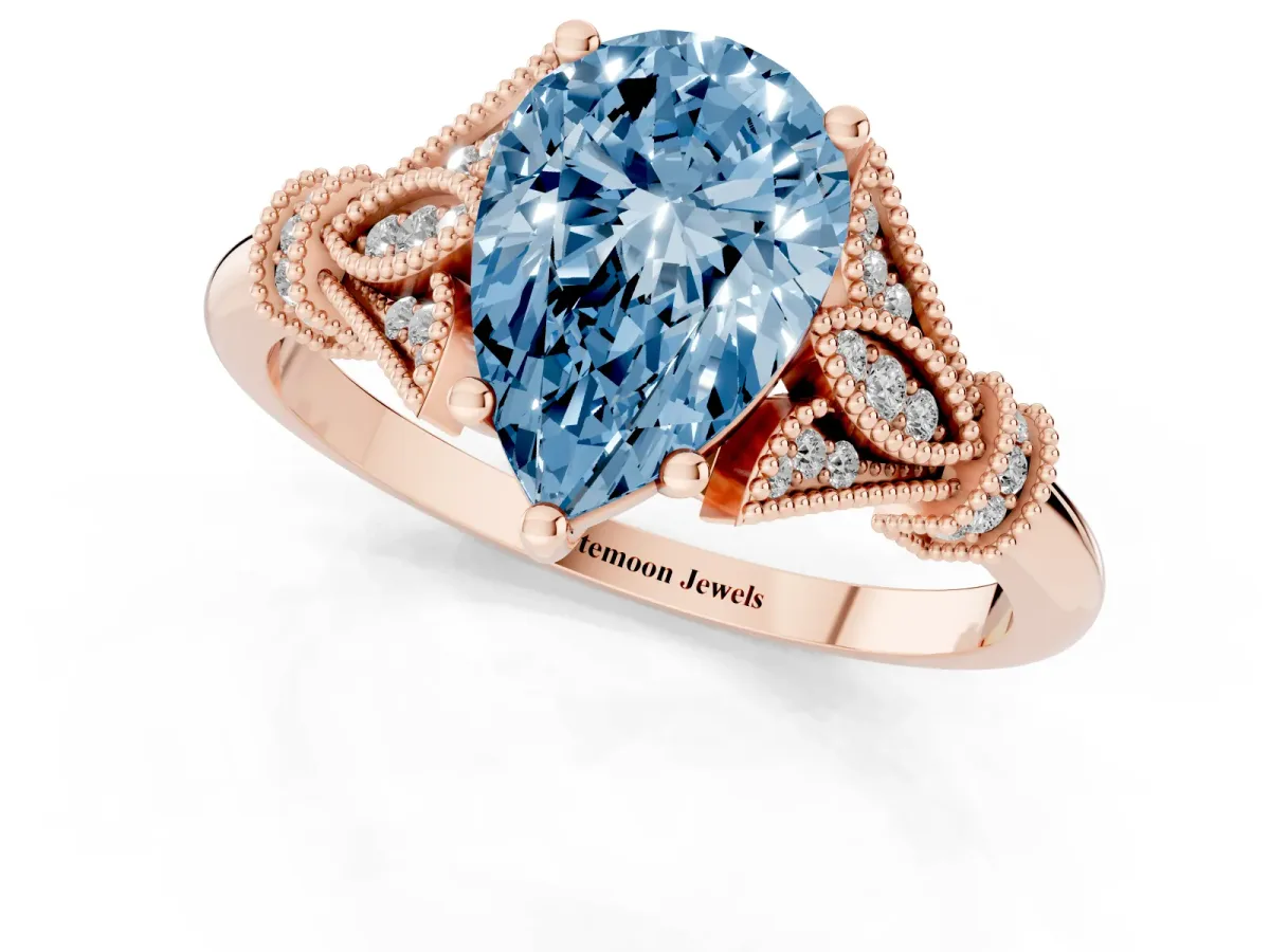 Fancy Blue Pear Cut Diamond Solitaire Ring with Floral Filigree and Pave Accents Rose gold