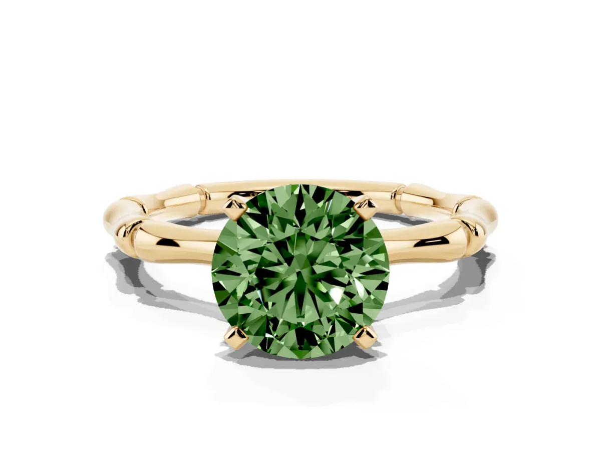 Fancy Green Round Cut Solitaire Diamond Ring with Bamboo Band and Four-Prong Setting Yellow gold