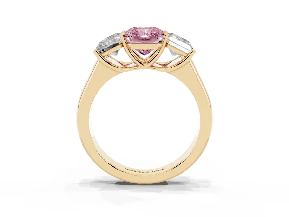 Fancy Pink Radiant Cut Three-Stone Diamond Ring with Prong Setting on a Classic Band Yellow gold