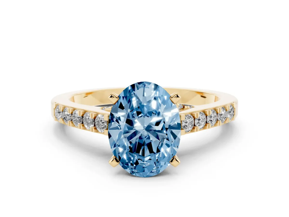 Fancy Blue Oval Cut Diamond Solitaire Ring with Crossover Gallery and Round Pavé Band Yellow gold