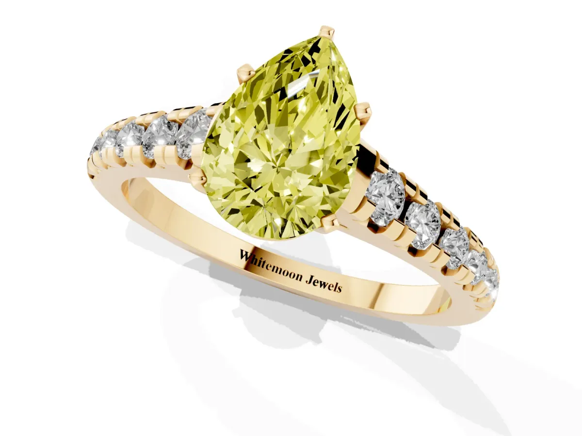 Fancy Yellow Pear Cut Diamond Cathedral Solitaire Ring with Round Pavé Band Yellow gold