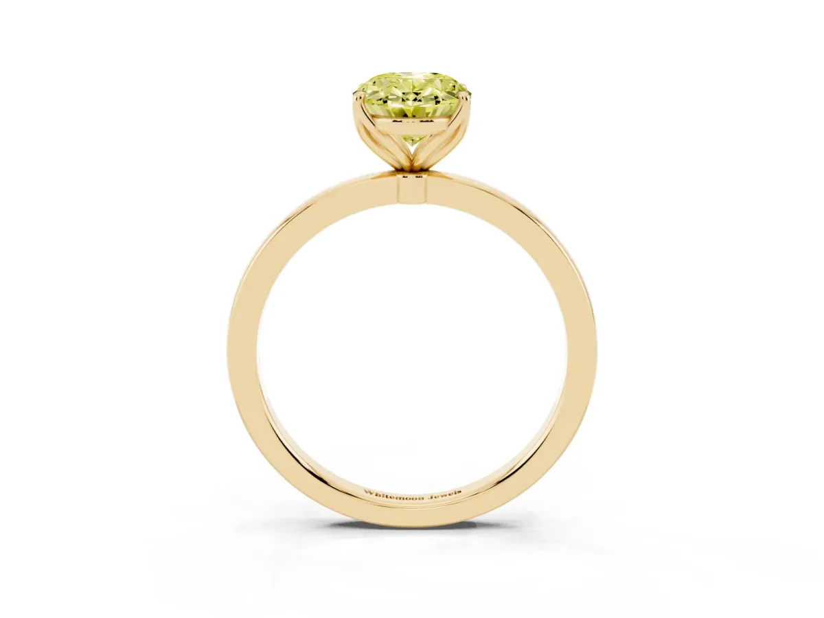Fancy Yellow Oval Cut Diamond Solitaire Ring with Thin Band and Prong Setting Yellow gold
