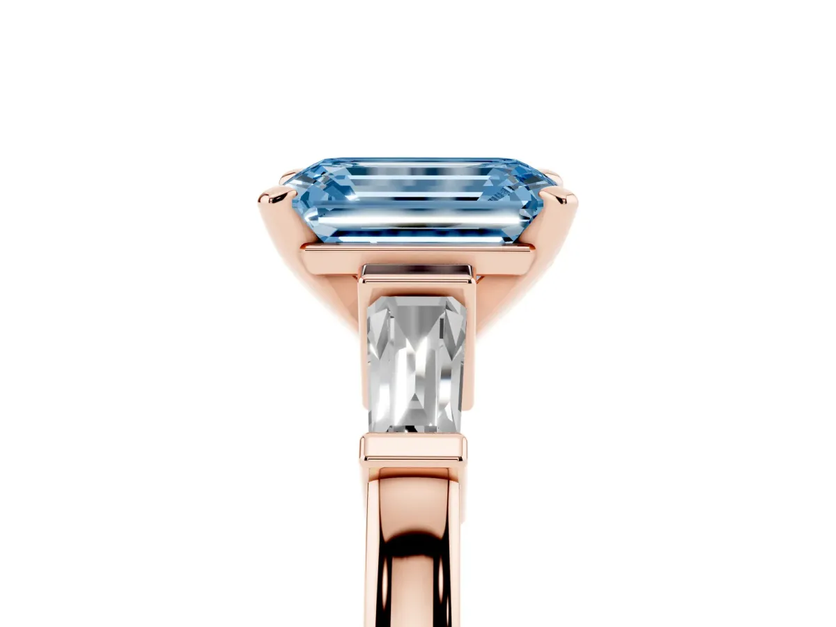 Fancy Blue Emerald Cut Cut Diamond Solitaire Ring with Tapered Baguette Accents and Four-Prong Setting Rose gold