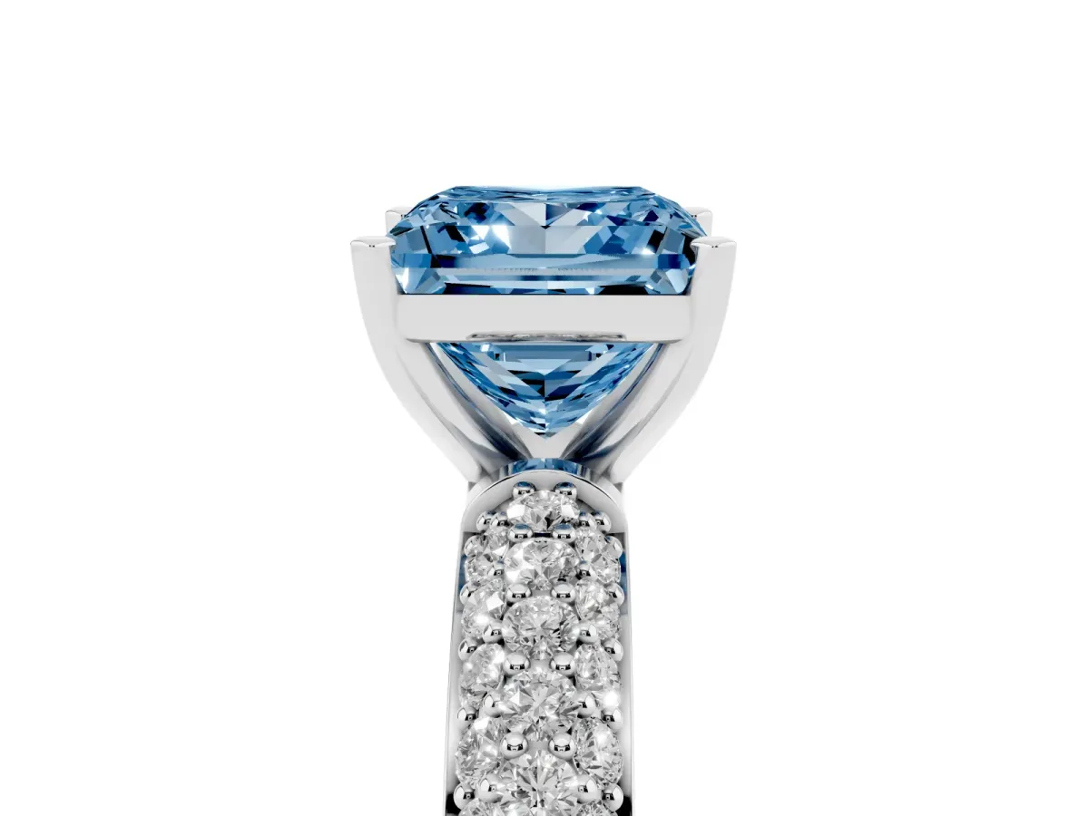 Fancy Blue Princess Cut Diamond Solitaire Ring with Prong Setting and Pavé Band Silver