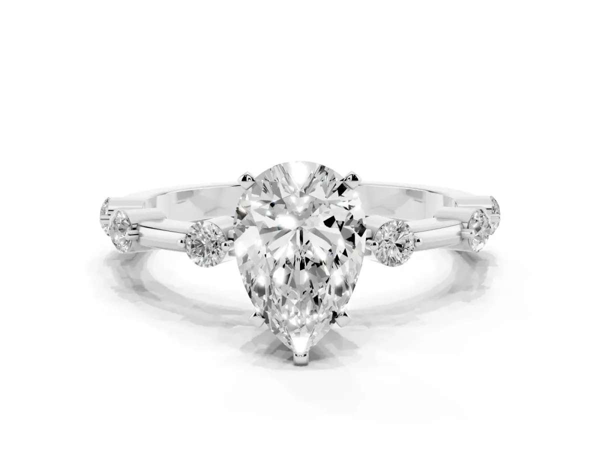 Pear Cut Solitaire Diamond Ring with Bezel Set Side Stones and Prong Setting White gold
