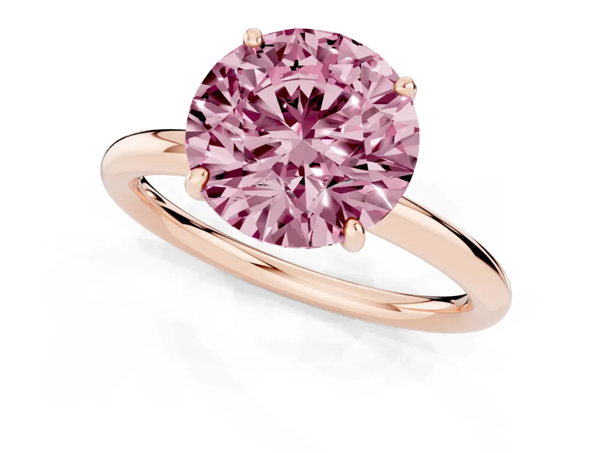 Fancy Pink Round Cut Solitaire Diamond Ring with Four-Prong Setting on a Plain Band Rose gold