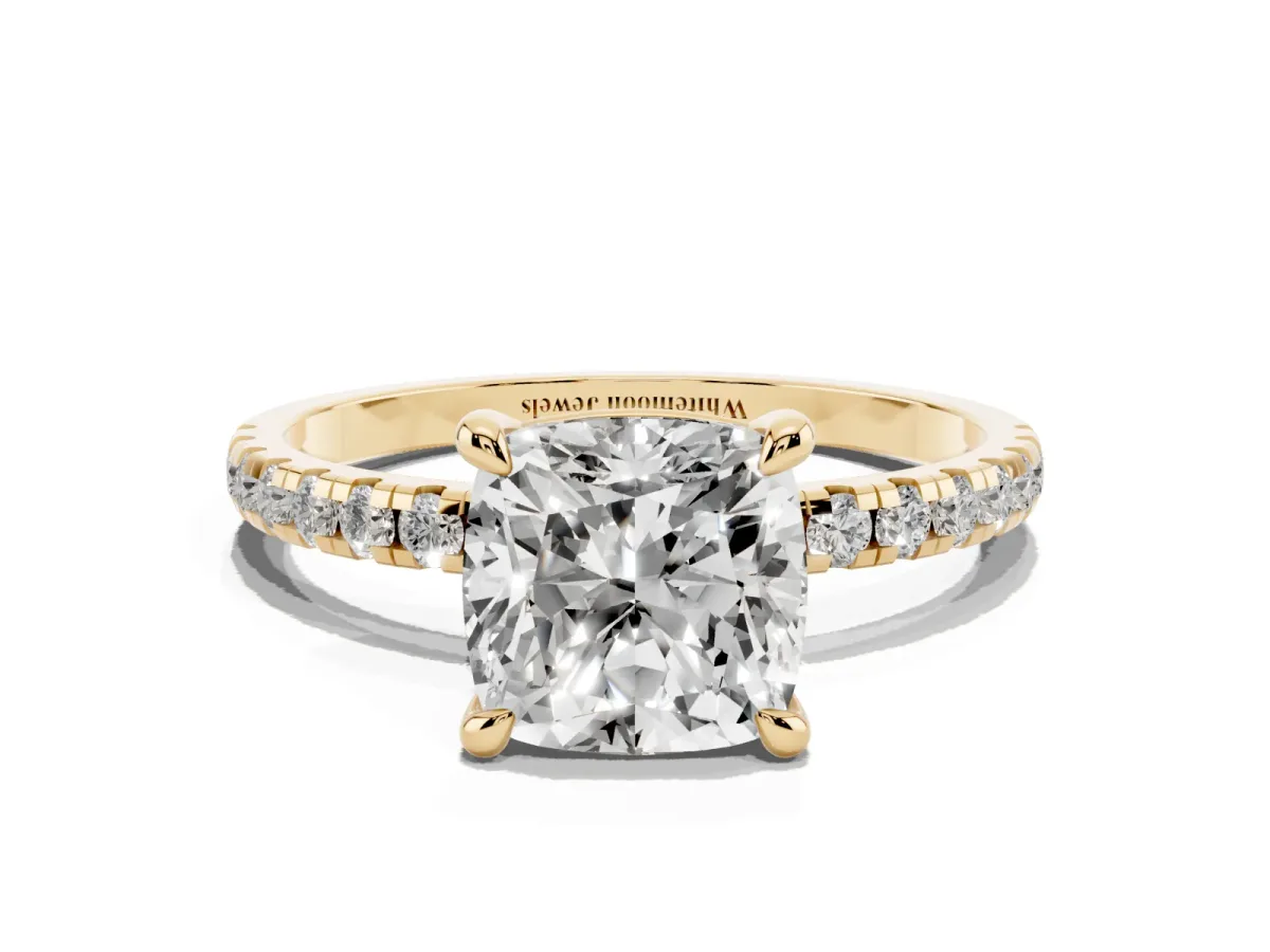 Cushion Cut Diamond Brilliant Solitaire Ring with Pavé Band and Four-Prong Setting Yellow gold