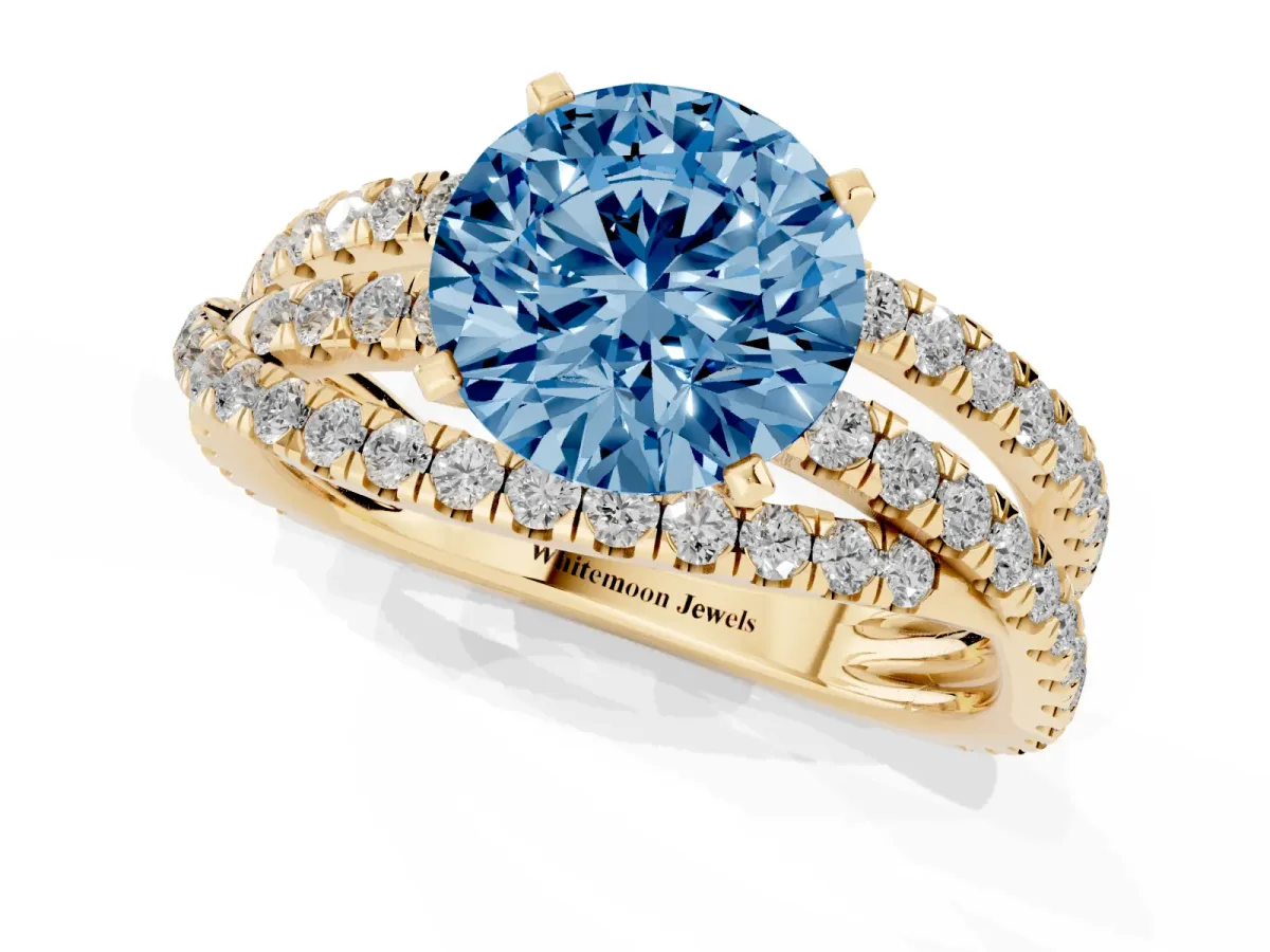 Fancy Blue Round Cut Solitaire Twist Band with Pavé Setting and Four-Prong Setting Yellow gold