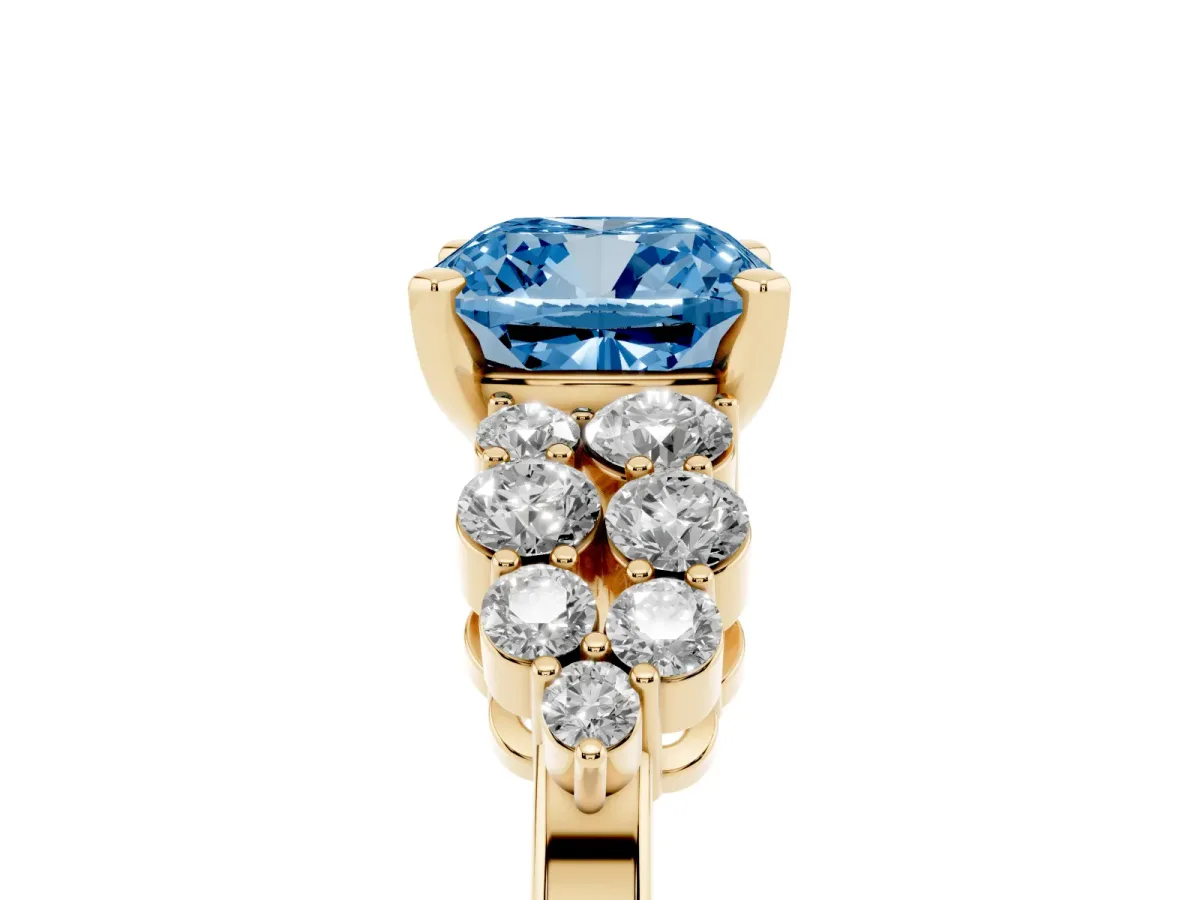Fancy Blue Cushion Cut Cluster Diamond Engagement Ring with Pavé Band and Four-Prong Setting Yellow gold