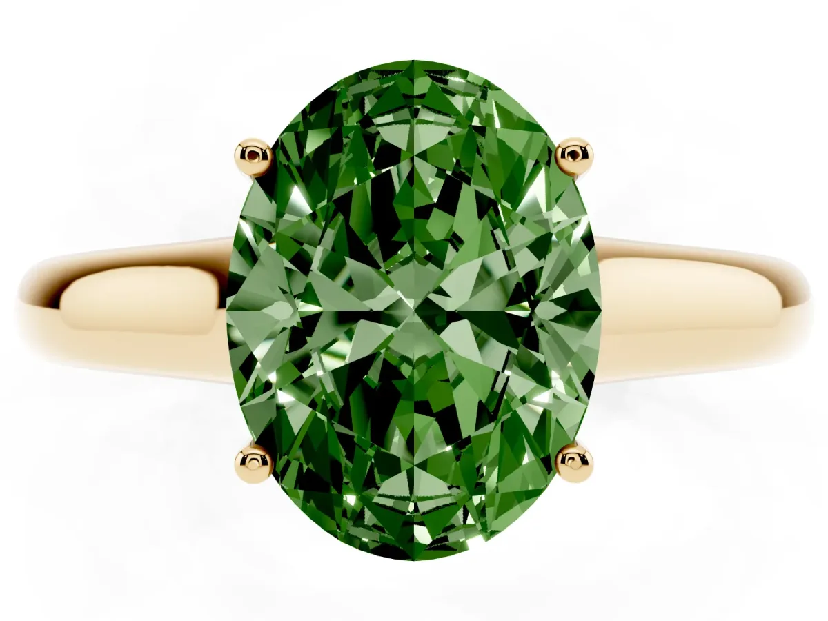 Fancy Green Oval Cut Solitaire Engagement Ring with Tapered Band and Four-Prong Setting Yellow gold