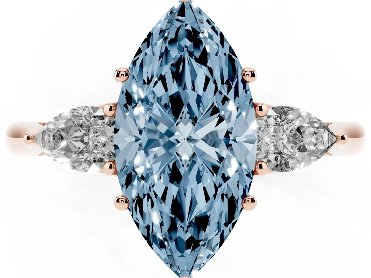 Fancy Blue Three-Stone Marquise Cut Diamond Ring with Pear Side Stones in Four-Prong Setting Rose gold
