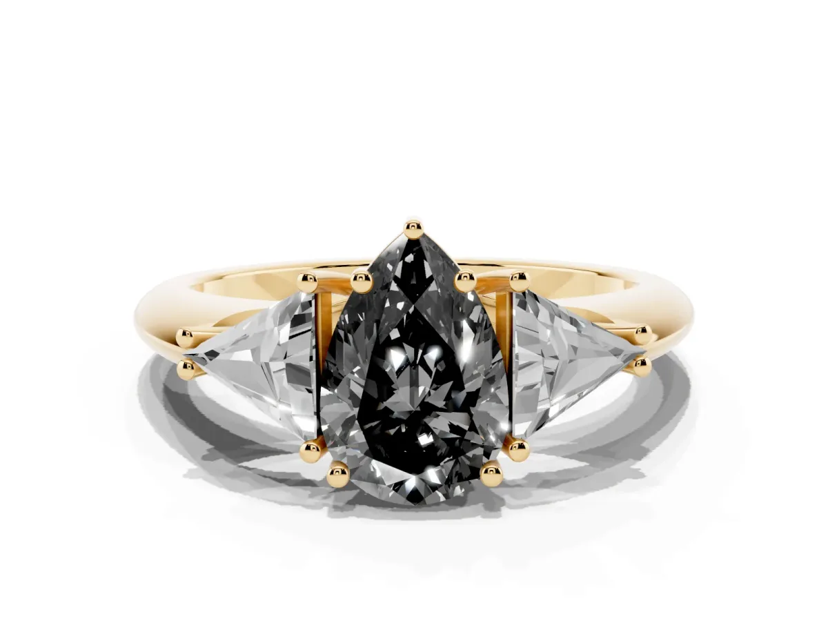 Fancy Black Three-Stone Pear Cut Diamond Engagement Ring with Trillion Side Stones and Prong Setting Yellow gold
