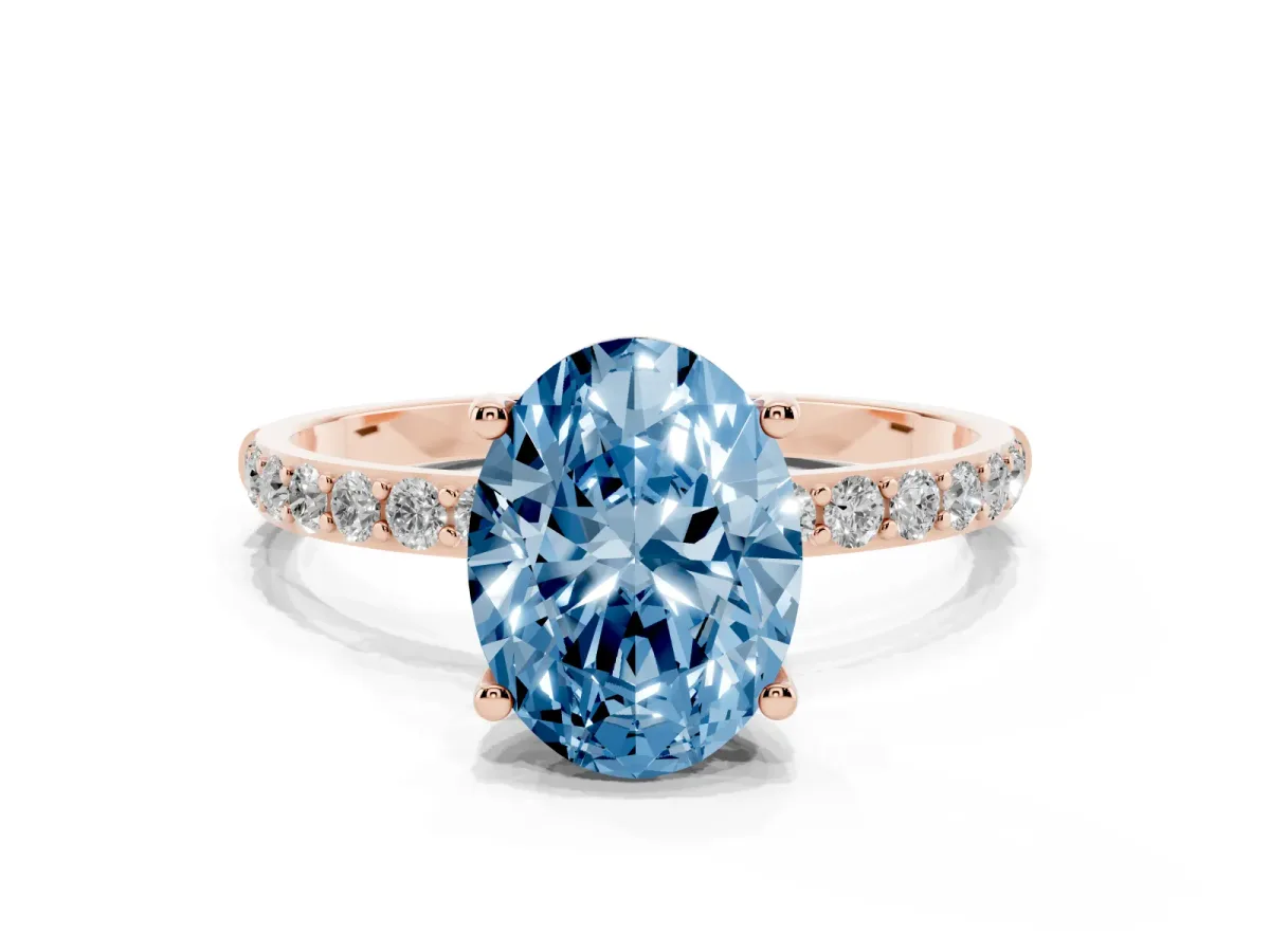 Fancy Blue Oval Cut Diamond Solitaire Ring with Round Pavé Shoulders and Prong Setting Rose gold