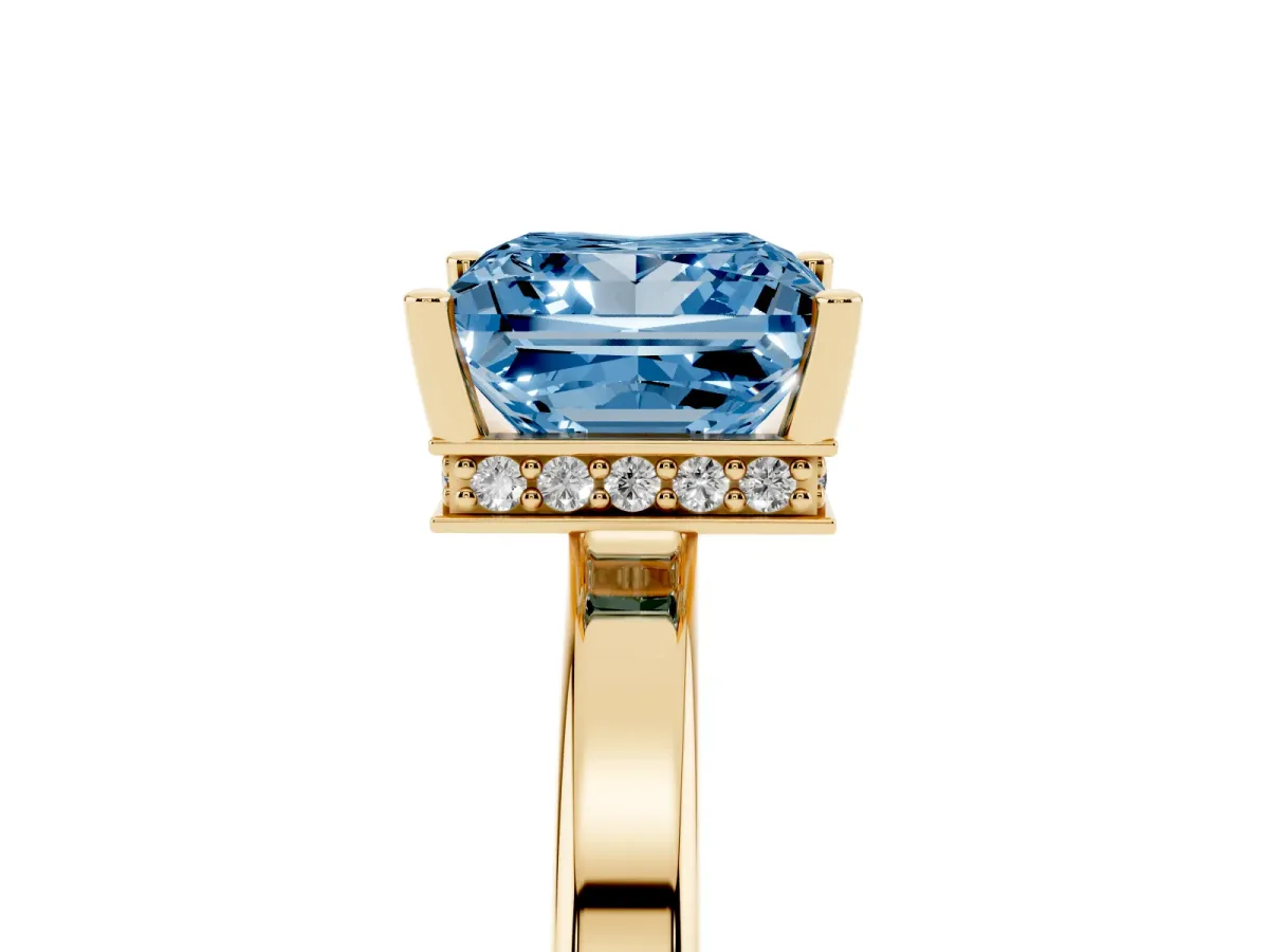 Fancy Blue Princess Cut Cut Solitaire Engagement Ring with Four-Prong Setting on a Classic Band Yellow gold