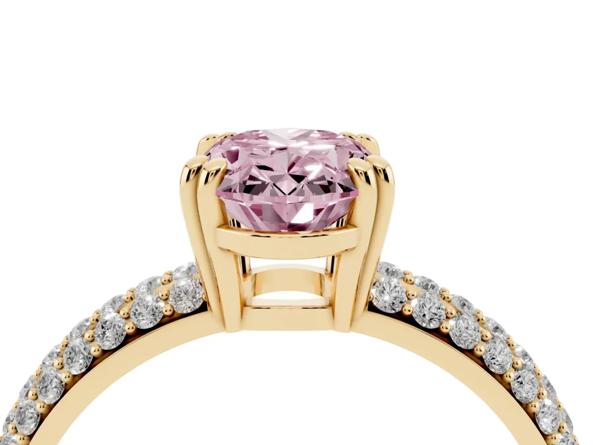 Fancy Pink Oval Cut Diamond Solitaire Ring with Multi-Row Round Pavé Band and Prong Setting Yellow gold