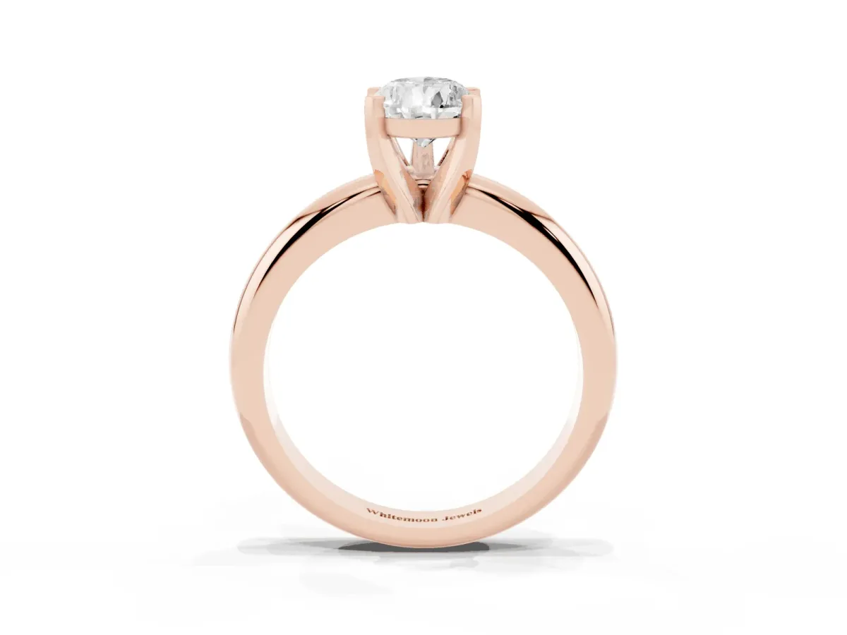 Pear Cut Diamond Solitaire Engagement Ring with Round Band and Four-Prong Setting Rose gold