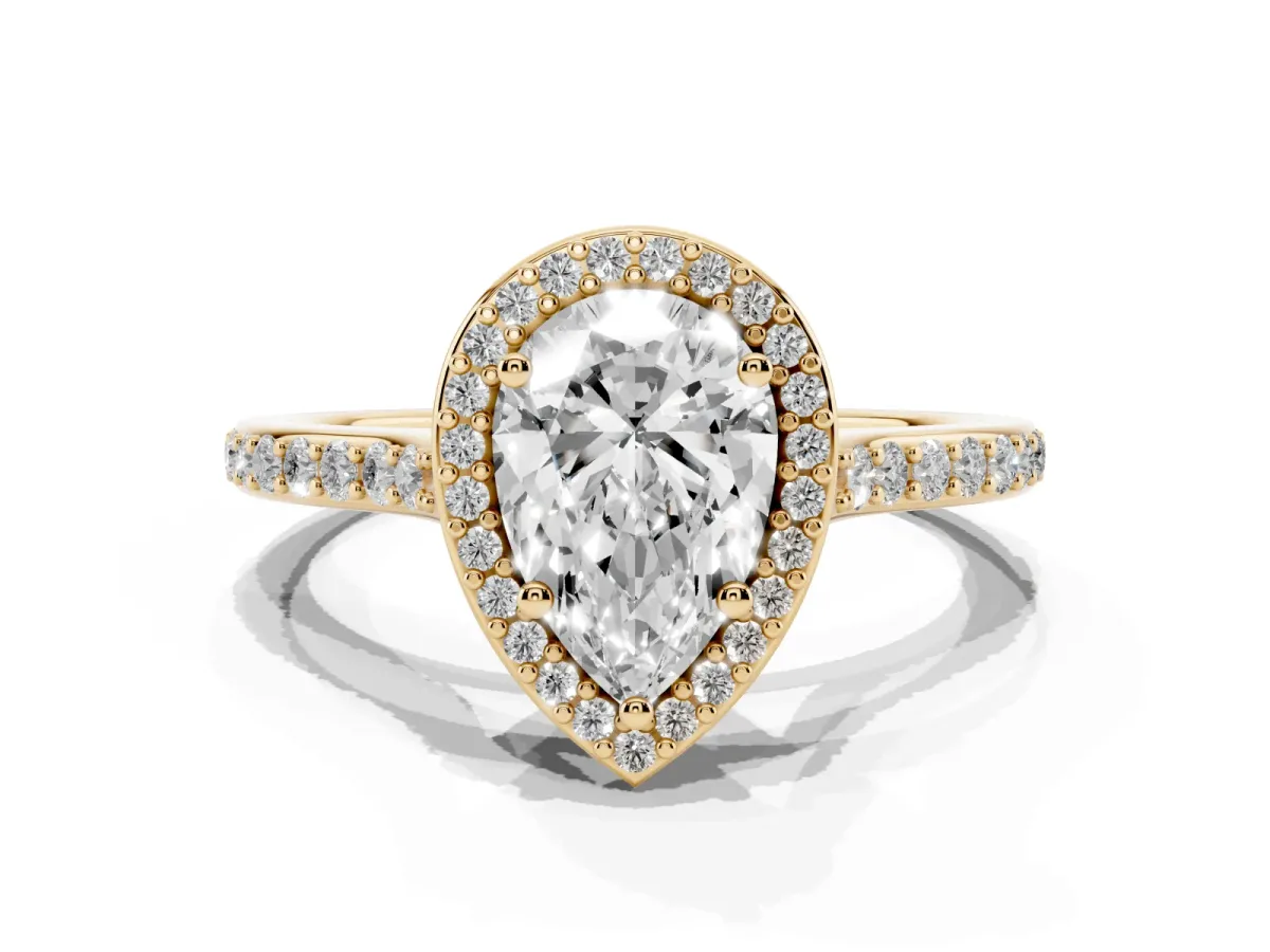 Pear Cut Diamond Halo Engagement Ring with Round Pavé Shoulders and Prong Setting Yellow gold