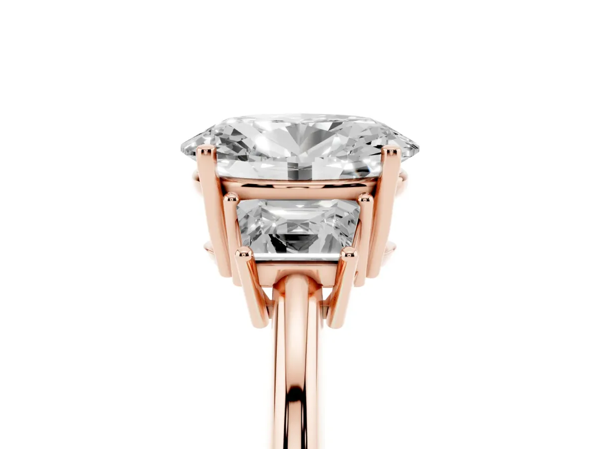 Oval Cut Diamond Three-Stone Ring with Trapezoid Side Stones and Prong Setting Rose gold