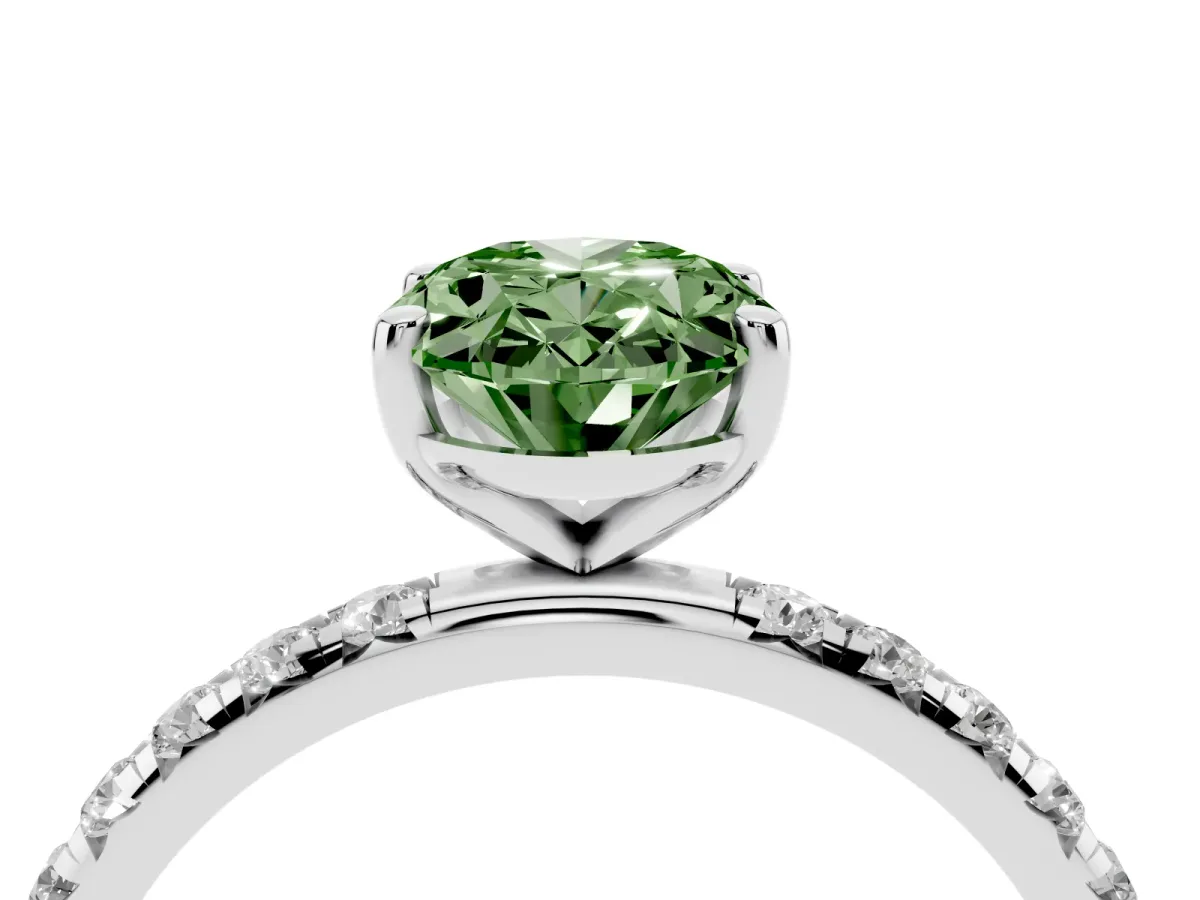 Fancy Green Oval Cut Cut Diamond Solitaire Ring with Micro Pave Band and Four Prong Setting Silver