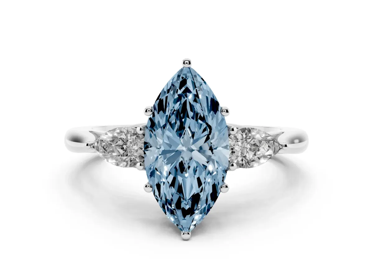 Fancy Blue Three-Stone Marquise Cut Diamond Ring with Pear Side Stones in Four-Prong Setting Silver