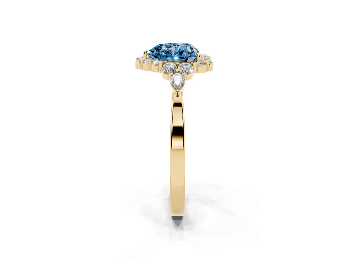 Fancy Blue Heart Cut Diamond Halo Ring with Pear Side Stones and Prong Setting Yellow gold