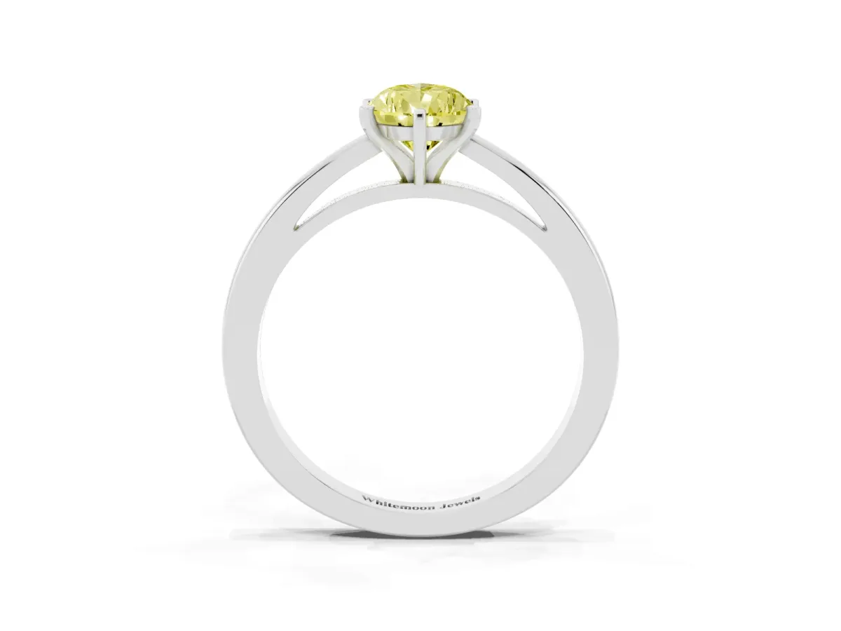 Fancy Yellow Pear Cut Solitaire Diamond Engagement Ring with Four-Prong Setting on a Classic Band White gold
