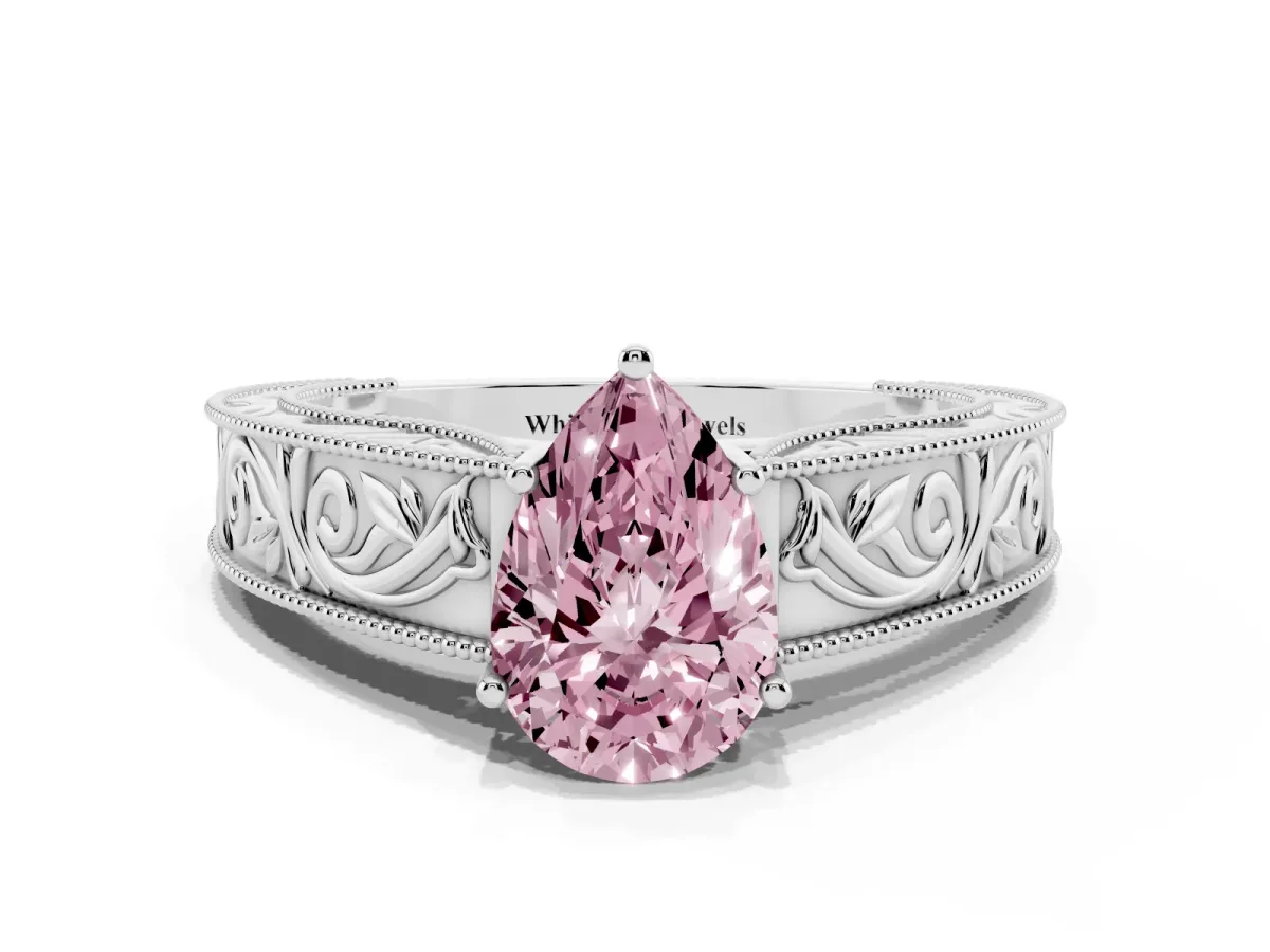 Fancy Pink Pear Cut Diamond Solitaire Ring with Engraved Band and Four-Prong Setting Silver