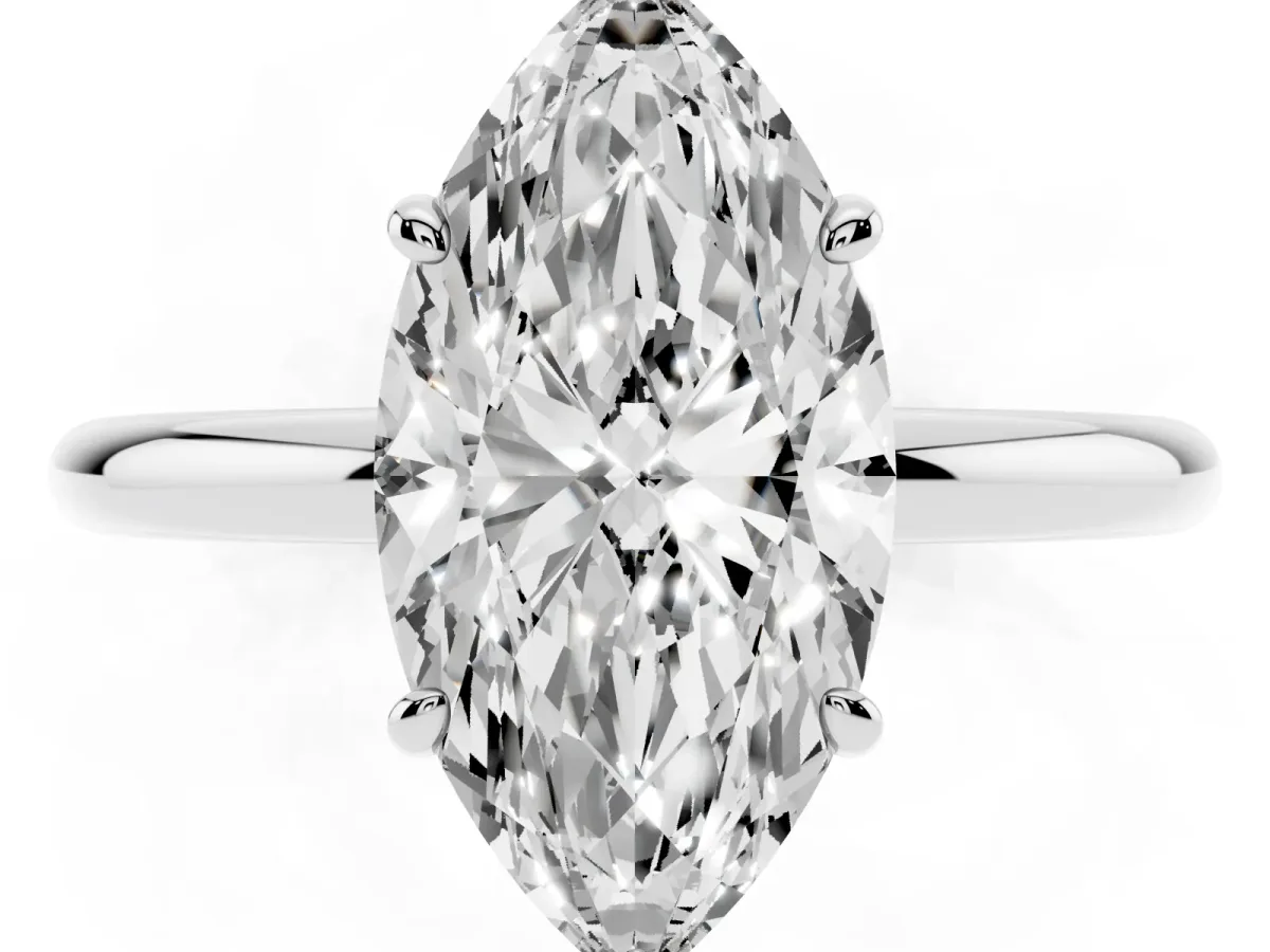 Marquise Cut Solitaire Diamond Ring with Four-Prong Setting on a Plain Band Platinum