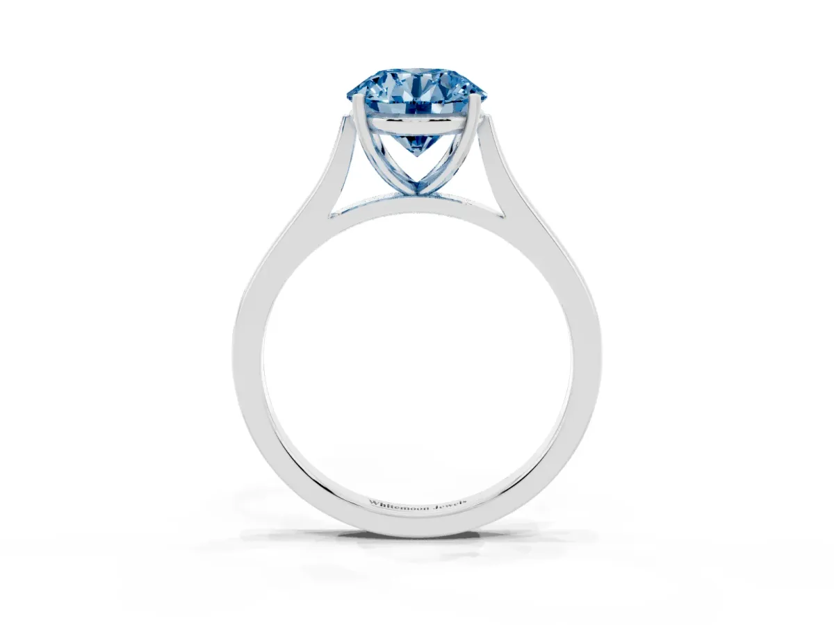 Fancy Blue Round Cut Solitaire Heart Prong Engagement Ring with Tapered Band Silver