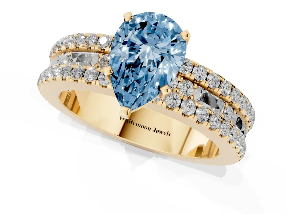 Fancy Blue Pear Cut Diamond Solitaire Ring with Pavé and Channel Set Band Yellow gold