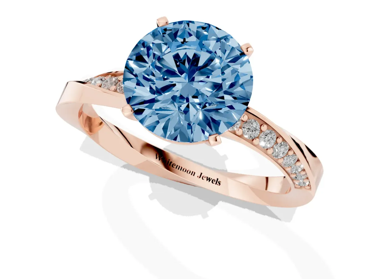Fancy Blue Round Cut Diamond Engagement Ring with Side Stone Accents and Four-Prong Setting Rose gold