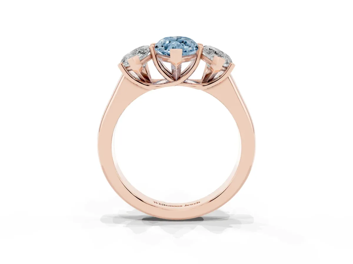 Fancy Blue Marquise Cut Three-Stone Diamond Ring with Prong Setting on a Classic Band Rose gold